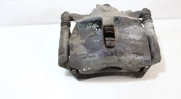 Volkswagen Golf VII Front brake caliper