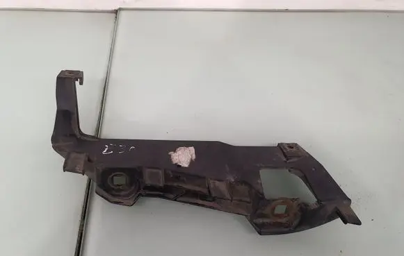 Headlight/headlamp mounting bracket