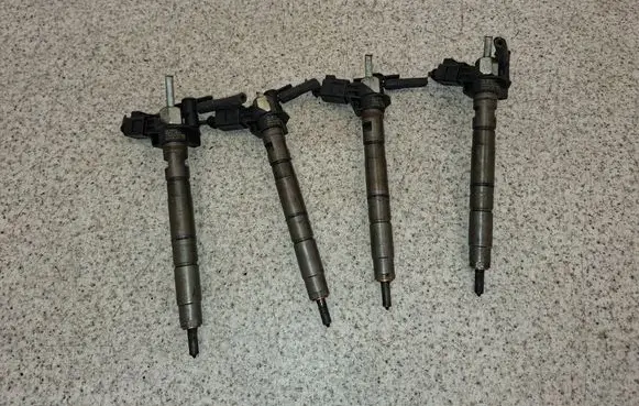 Volkswagen PASSAT B7 Fuel injectors set 03L130277 09071400314 0445116030