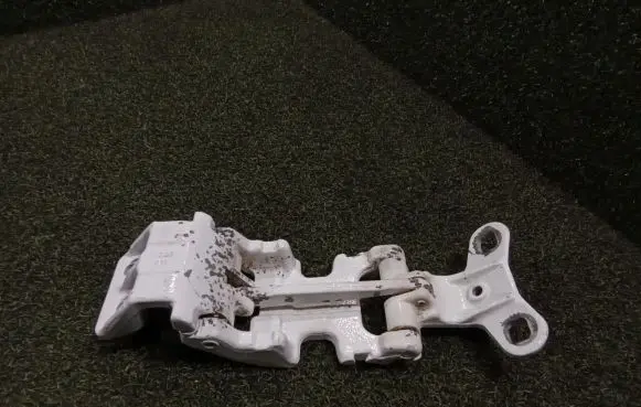 Rear door upper hinge