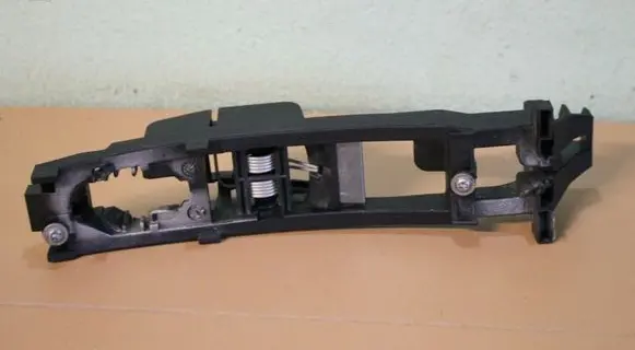 Rear door exterior handle/bracket