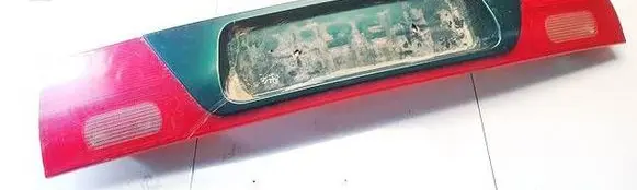 Trunk door license plate light bar