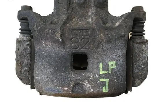 Nissan Juke I F15 Front brake caliper