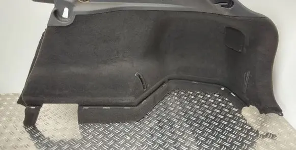 Trunk/boot lower side trim panel