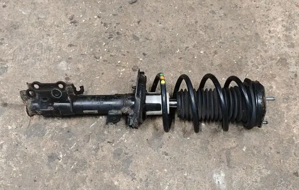 Ford Fiesta Front shock absorber with coil spring C1BC18045BE C1BC18045 E3528101