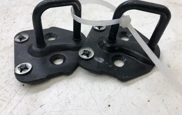 Tailgate lock loop/hook striker