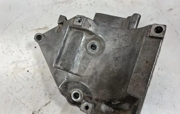 Volkswagen PASSAT B5 A/C compressor mount bracket 06B260885 52394 68260885