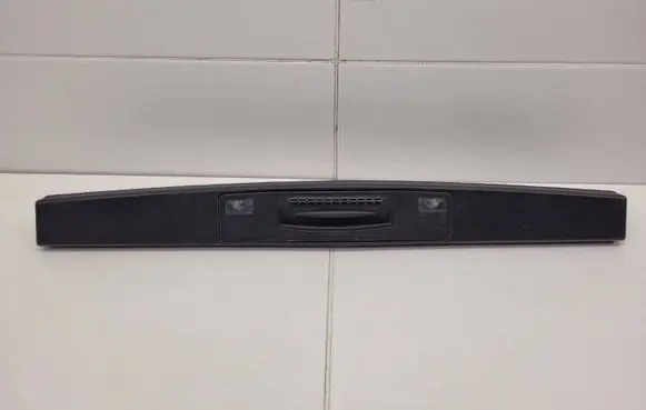 Trunk door license plate light bar