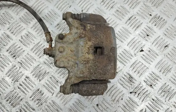 Nissan Juke I F15 Front brake caliper
