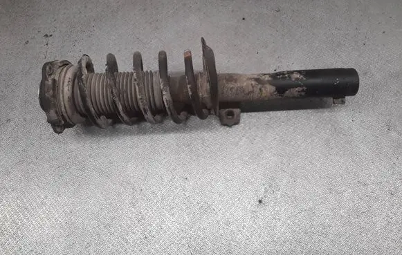 Volkswagen Caddy Front shock absorber with coil spring