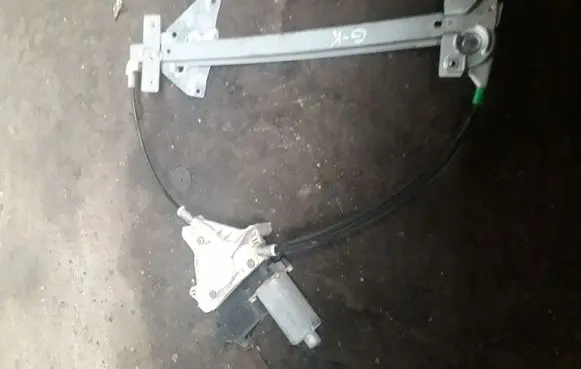 Mitsubishi Carisma Rear door window regulator with motor