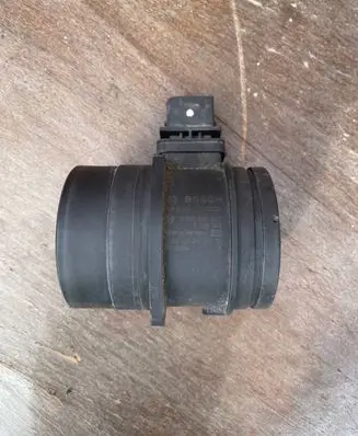 BMW 1 E81 E87 Mass air flow meter 7788743 0281002567