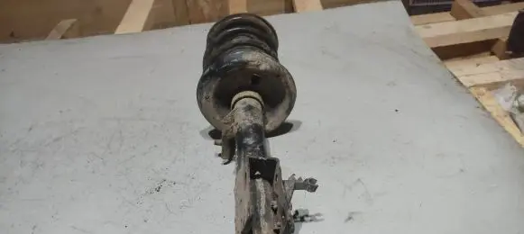 Front shock absorber with coil spring