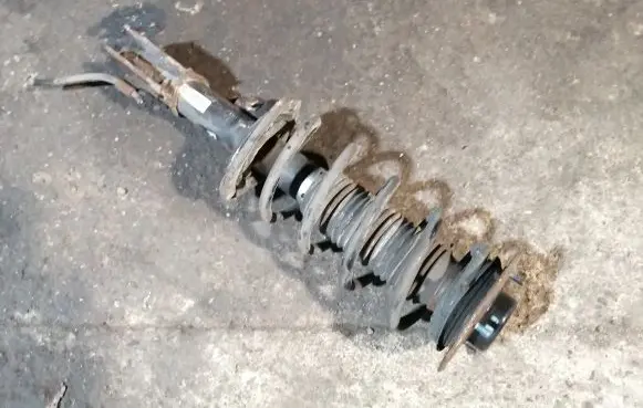 Opel Antara Front shock absorber with coil spring 95147608