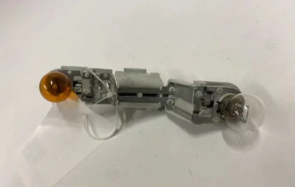Volvo V50 Tail light bulb cover holder