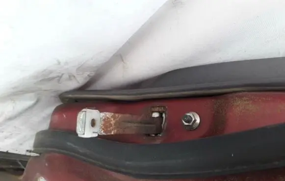 Mazda 626 Rear door check strap stopper