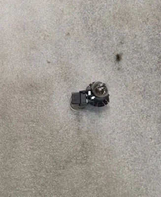 Tail light bulb cover holder