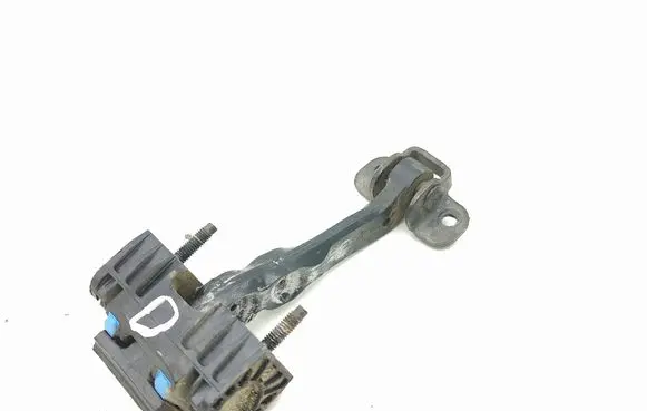 Front door check strap stopper