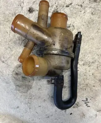 Thermostat/thermostat housing