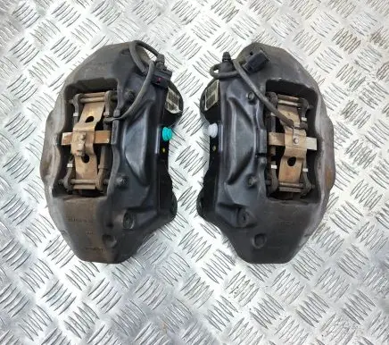 Volkswagen Touareg II Front brake caliper 7P6615106AF 7P6615105AF