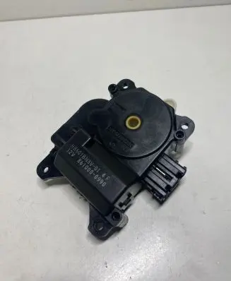 Mazda 3 I Air flap motor/actuator 8610000990 HB601BN8V01