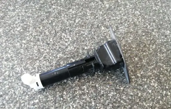 Headlight washer spray nozzle