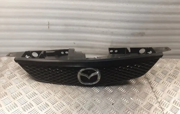 Mazda 323 Front bumper upper radiator grill