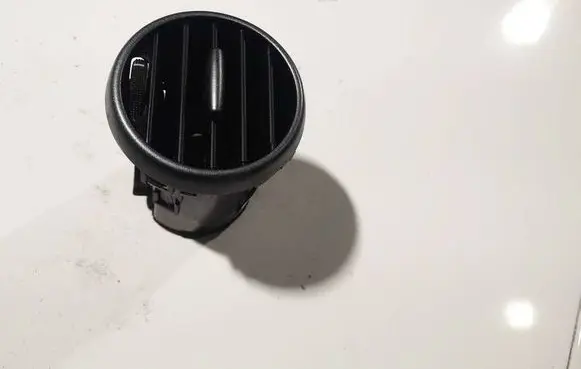 Dash center air vent grill