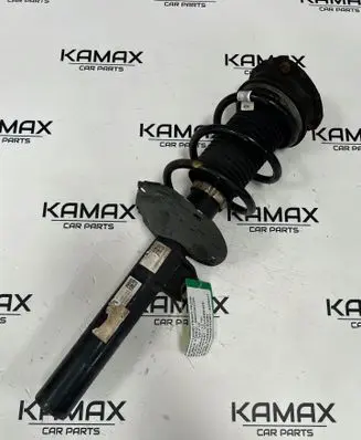 Volkswagen Golf VII Front shock absorber with coil spring 5Q0413023ER
