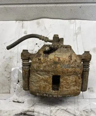 Nissan Almera N16 Front brake caliper