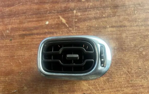 Dash center air vent grill