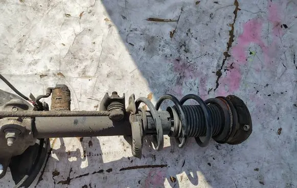 Volkswagen Golf VII Front shock absorber with coil spring