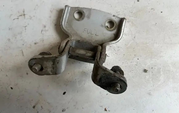 Front door lower hinge