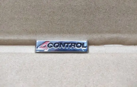 Renault Laguna III Front door emblem/model letters 990882613R