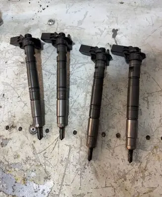 Volkswagen PASSAT B6 Fuel injectors set 03L130277 0445116 090127