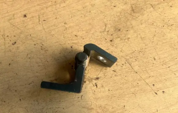 Rear door upper hinge