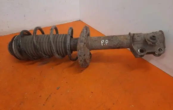 Opel Corsa D Front shock absorber with coil spring