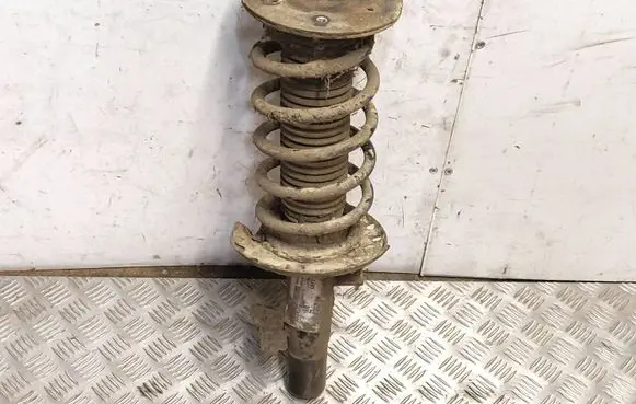 Front shock absorber with coil spring