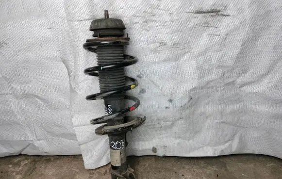 Front shock absorber with coil spring