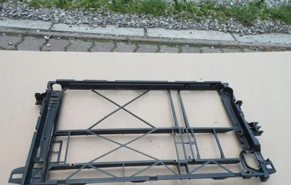 Radiator support slam panel bracket