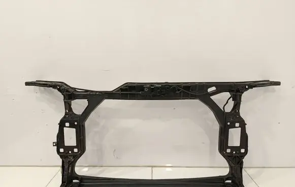 Radiator support slam panel