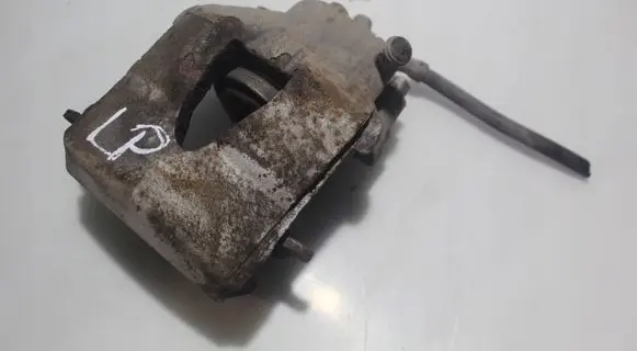 Volkswagen Golf VI Front brake caliper