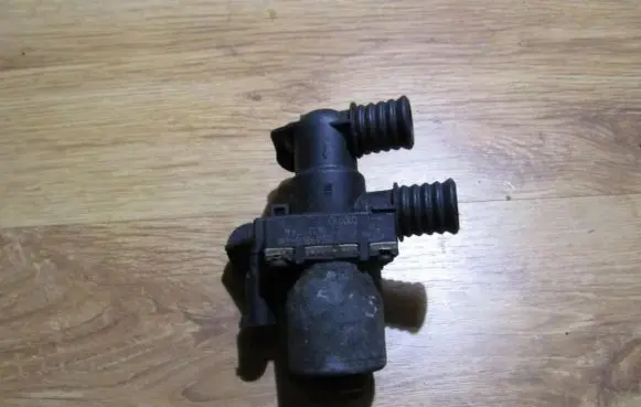 Coolant heater control valve