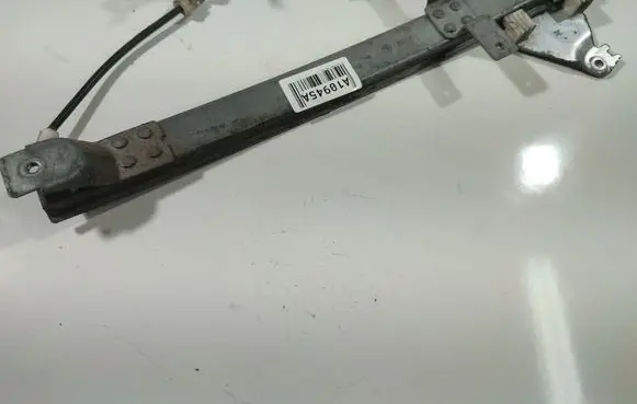 Nissan Almera Tino Front door window regulator with motor 1114930
