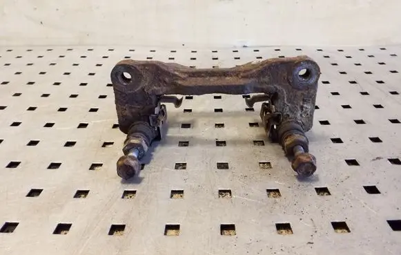 Subaru Outback Brake caliper pad carrier rear 