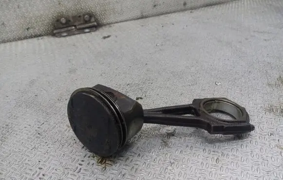 Piston with connecting rod