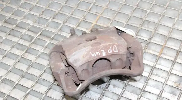 Nissan Juke I F15 Front brake caliper