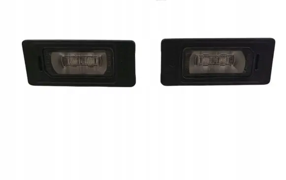 Trunk door license plate light bar