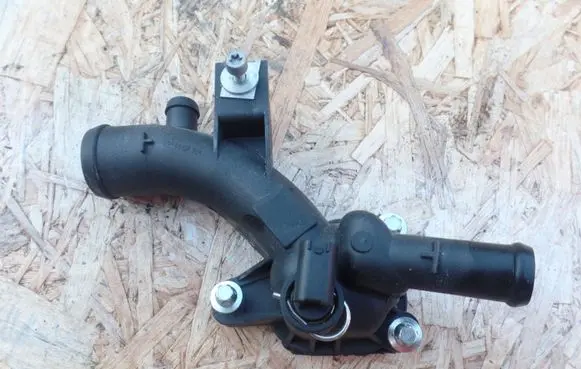 Opel Corsa D Thermostat housing TOPRAN208977 1338487