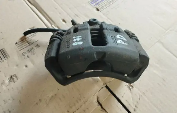 Mitsubishi Colt Front brake caliper